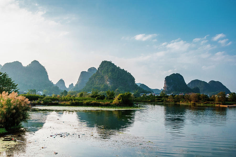The karst mountains and river scenery Photograph by Carl Ning - Fine ...