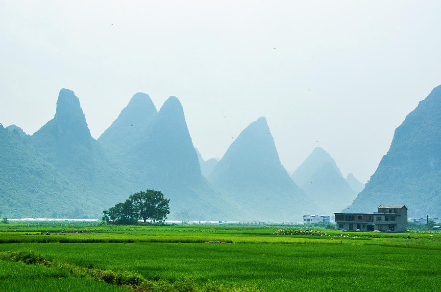 Karst mountains and rural scenery #22 Photograph by Carl Ning