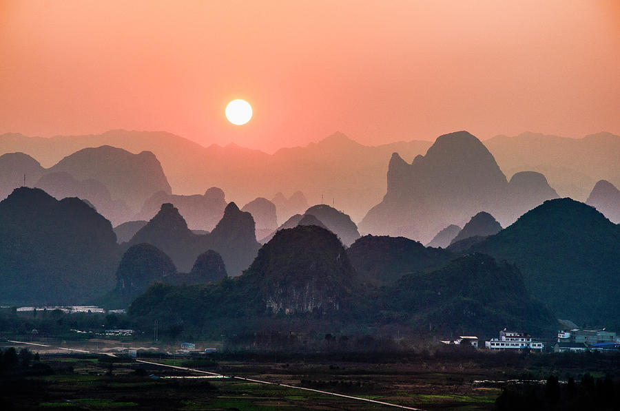 Karst mountains scenery in sunset #22 Photograph by Carl Ning