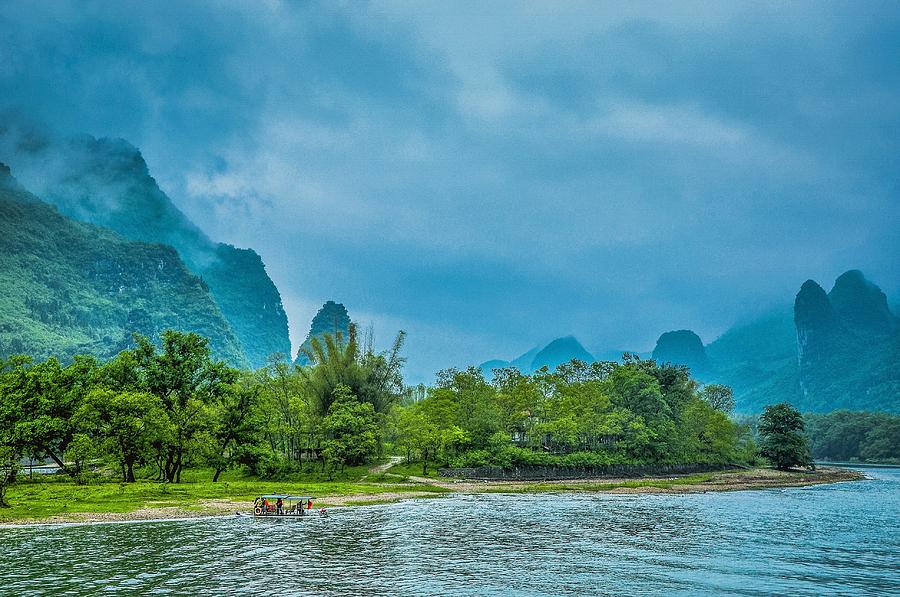 Karst mountains and Lijiang River scenery #25 Photograph by Carl Ning