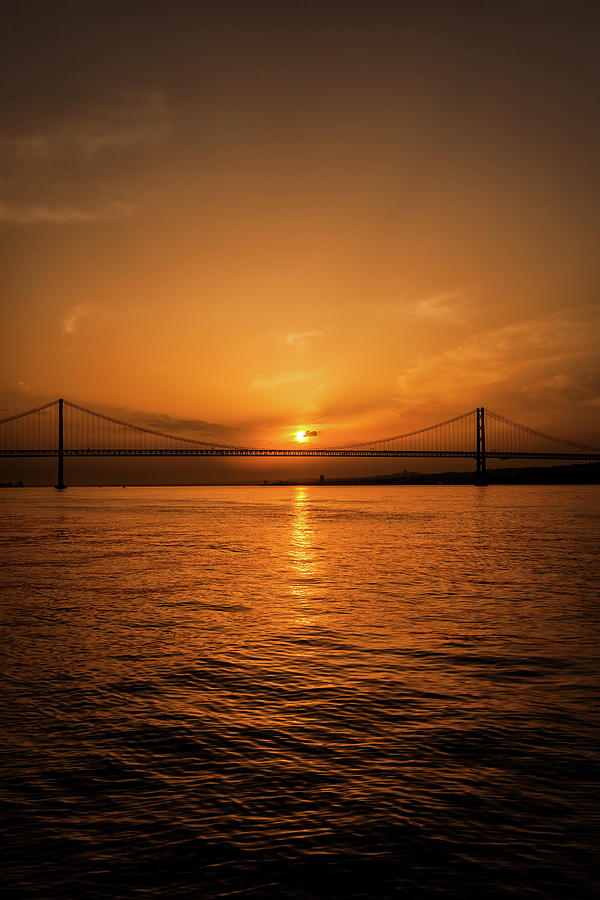 25th of April Bridge on Tagus in Lisbon Photograph by Artur Bogacki