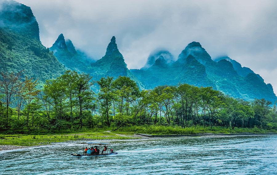 Karst mountains and Lijiang River scenery #26 Photograph by Carl Ning