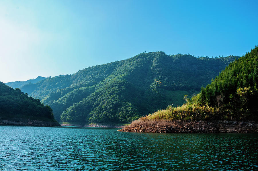 The mountains and reservoir scenery with blue sky #27 Photograph by Carl Ning