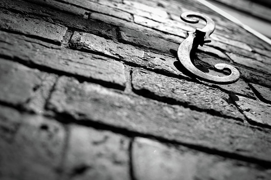 Iron and brick Photograph by Vintage Pix