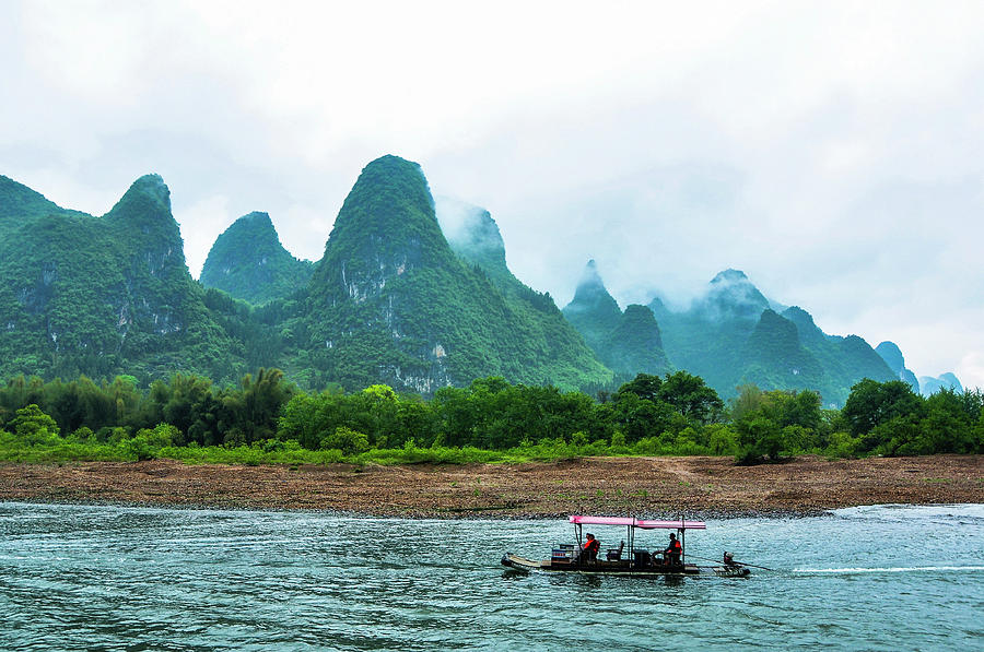 The beautiful karst mountains and Lijiang river scenery Photograph by ...