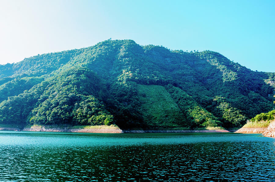 The mountains and reservoir scenery with blue sky #28 Photograph by Carl Ning