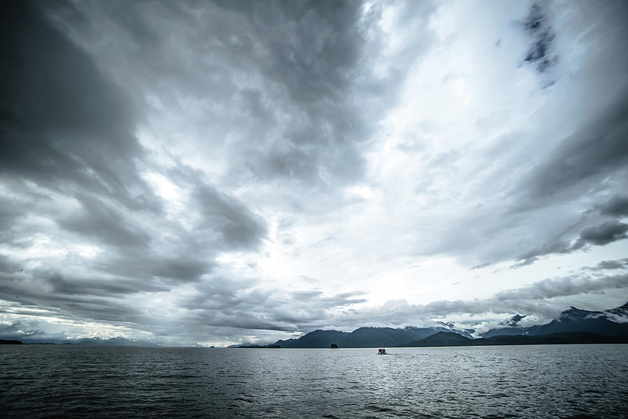 abstract cloudy waterscape AND MOUNTAIN RANGE IN ALASKA #3 Photograph by Alex Grichenko