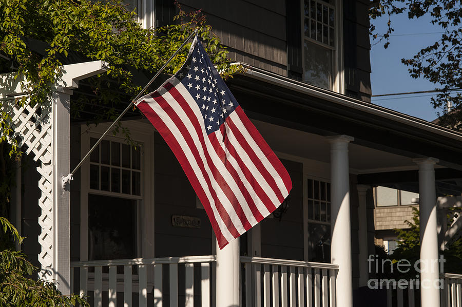 American Flag on porch #3 Photograph by Jim Corwin