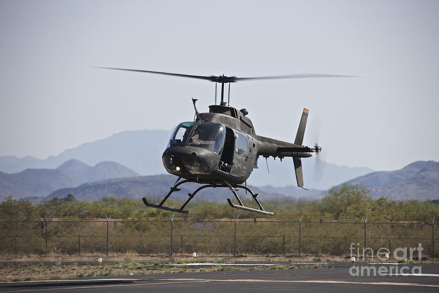 An Oh-58 Kiowa Helicopter Of The U.s #3 Photograph by Terry Moore