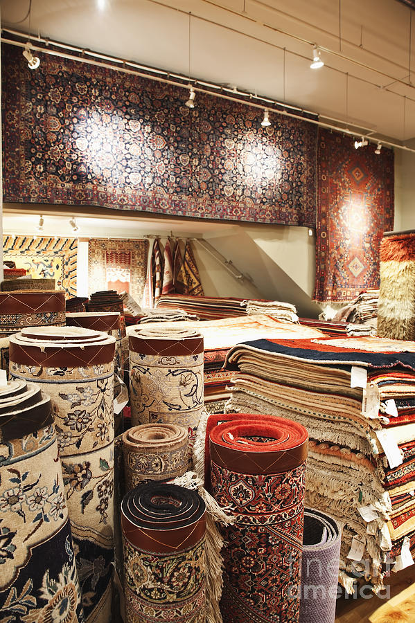 Area Rugs in a Store Photograph by Jetta Productions, Inc