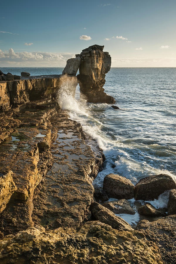 Beautiful vibrant sunset landscape image of Portland Bill rocks ...