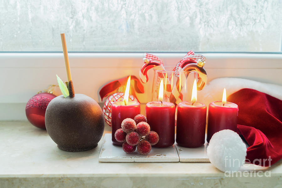 Christmas Scene with Burning Candles Photograph by Anastasy Yarmolovich