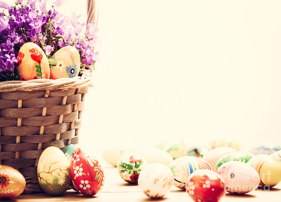 Colorful hand painted Easter eggs in basket and on wood #3 Photograph by Michal Bednarek