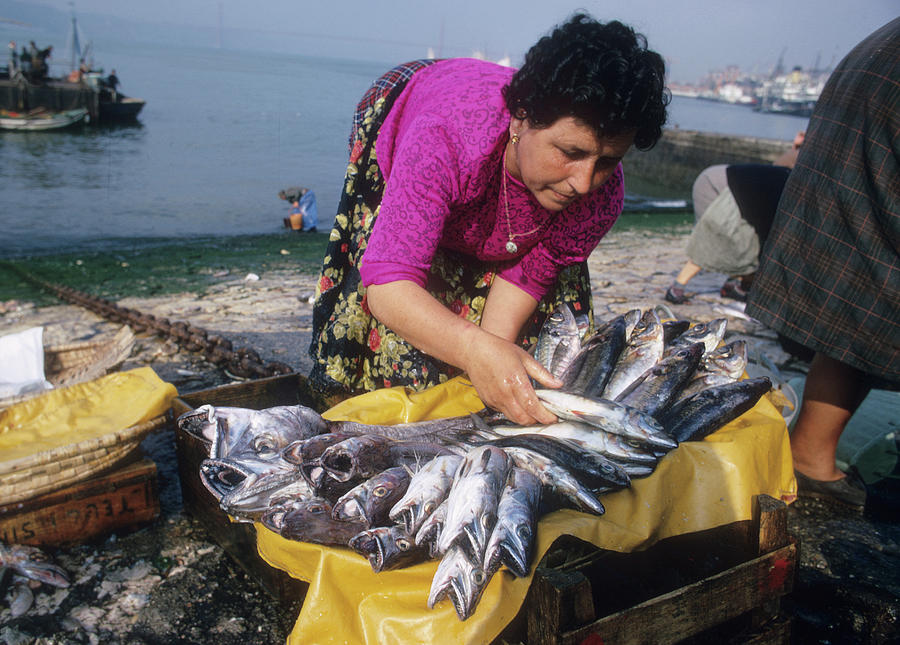 Woman Photograph - Fish Monger in Lisbon #3 by Carl Purcell