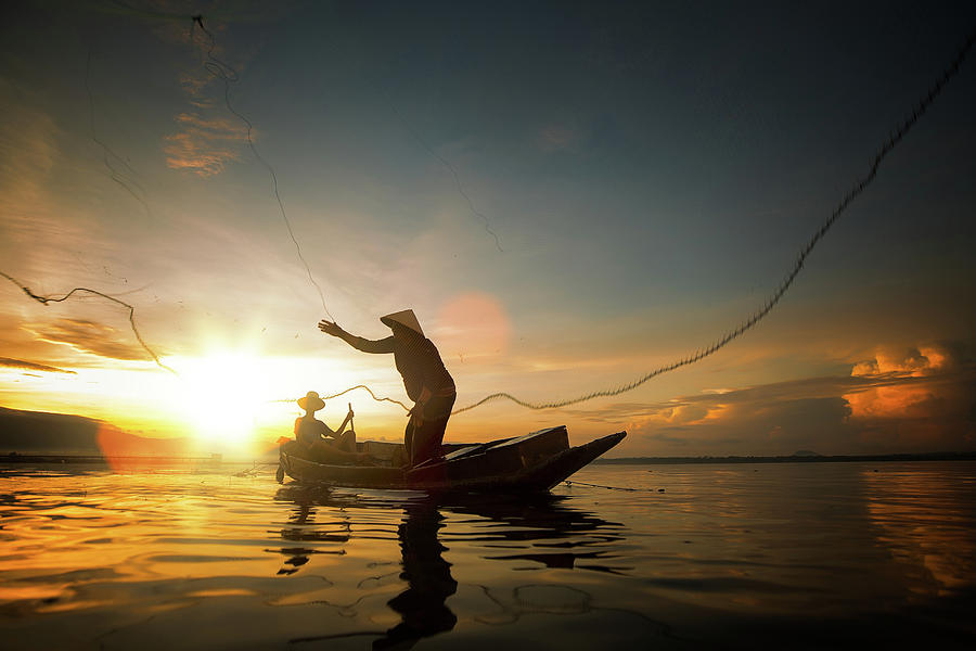 Fisherman in Thailand Photograph by Anek Suwannaphoom - Fine Art America