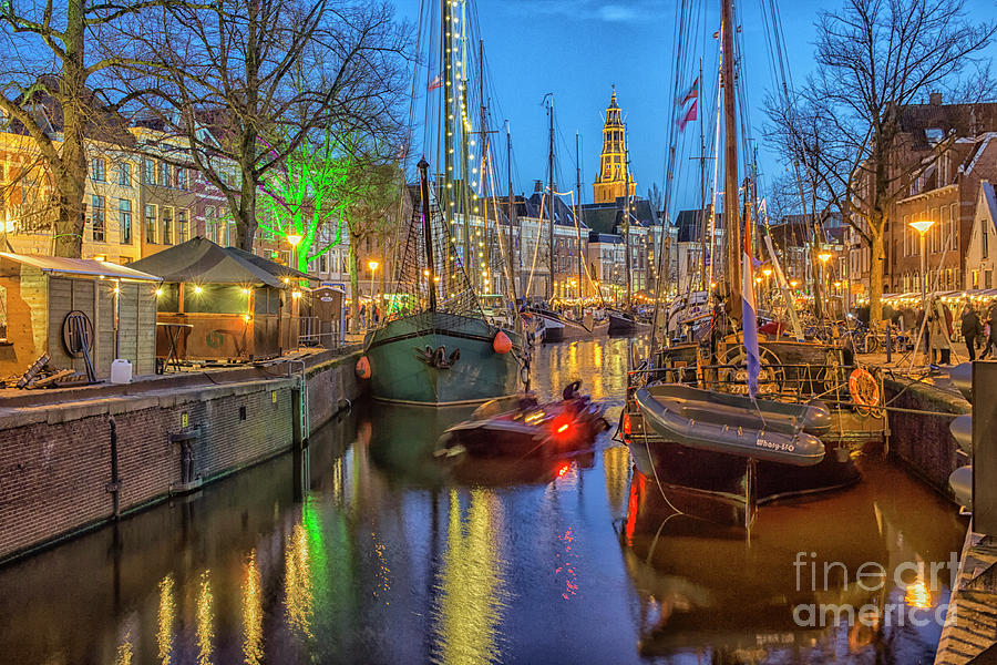 Boats and reflections of light in Groningen at night Photograph by Patricia Hofmeester