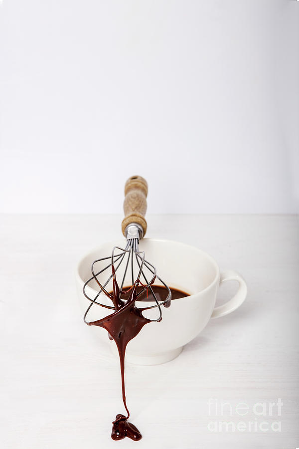 Molten chocolate on a whisk #3 Photograph by Piotr Marcinski - Pixels