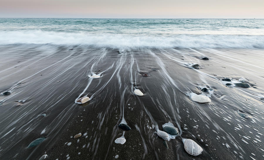 Pebbles in the beach and flowing sea water #4 Photograph by Michalakis Ppalis