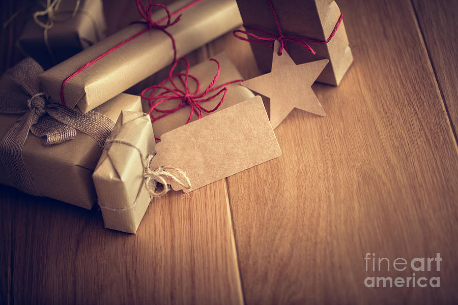 Christmas Photograph - Rustic retro gift, present boxes with tag. Christmas time, eco paper wrap. #3 by Michal Bednarek
