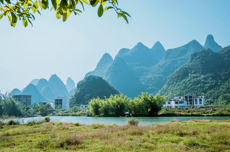 The karst mountains and river scenery #3 Photograph by Carl Ning