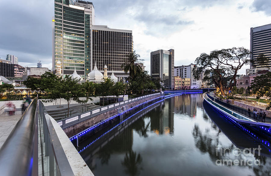 The office buildings reflects in the water of the Klang river in #3 Photograph by Didier Marti