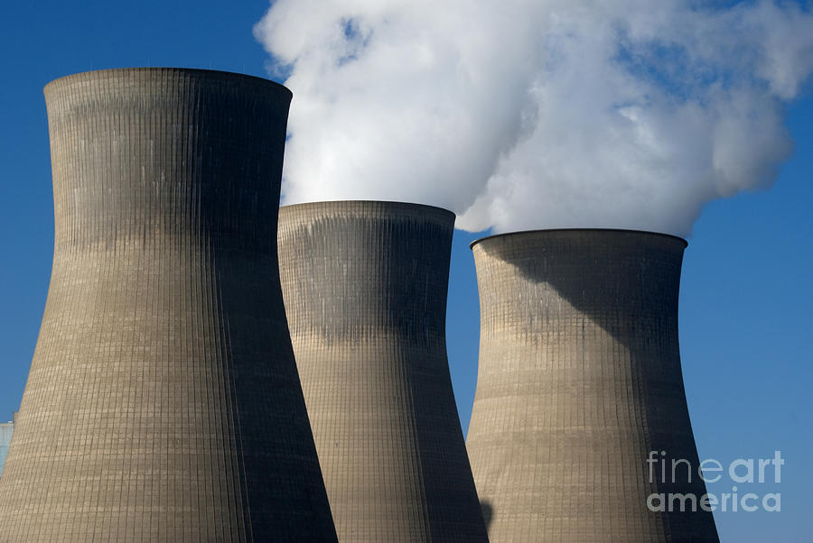 Three Cooling Towers At A Power Plant. Photograph