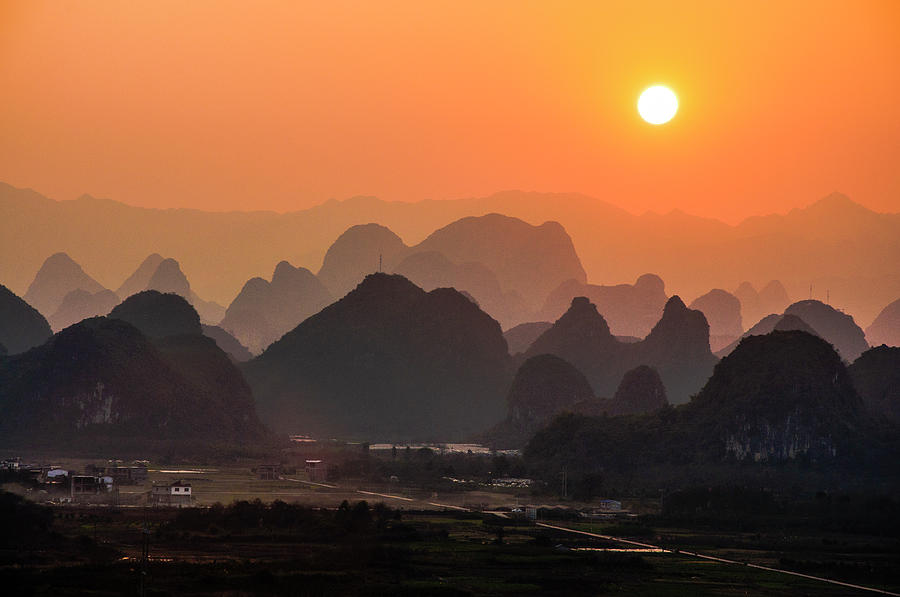 Karst mountains scenery in sunset #30 Photograph by Carl Ning