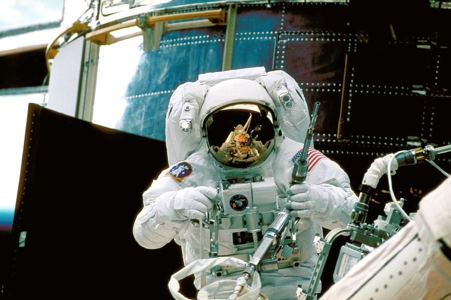 Astronaut at Work 10 Photograph by Steve Kearns