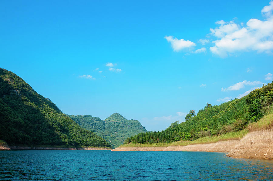 The mountains and reservoir scenery with blue sky #32 Photograph by Carl Ning