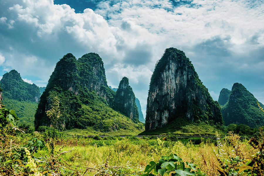 Karst mountains and  rural scenery #33 Photograph by Carl Ning