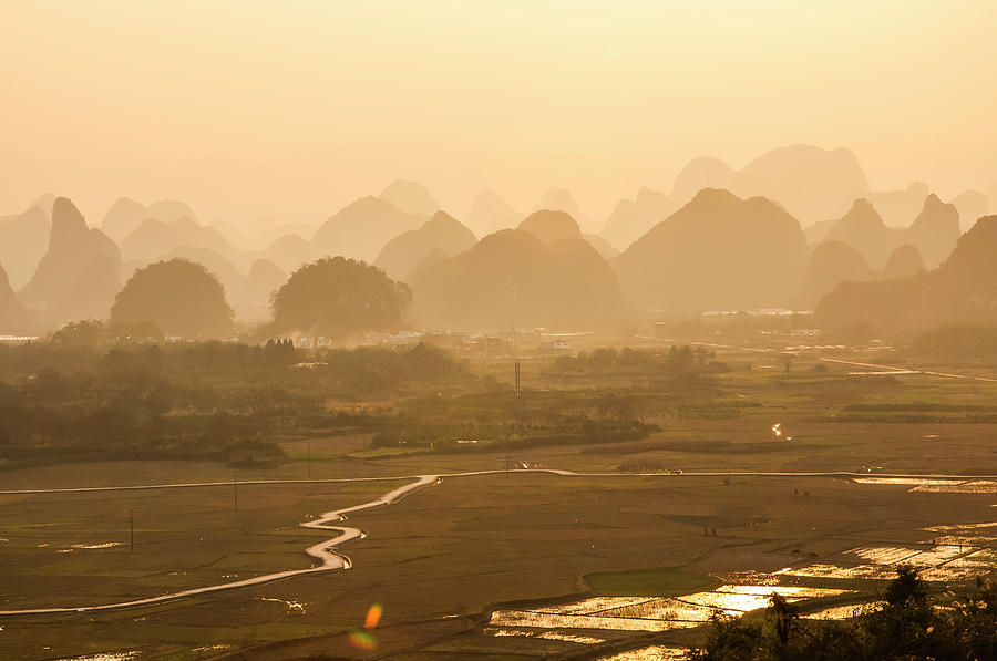 Karst mountains scenery in sunset #33 Photograph by Carl Ning