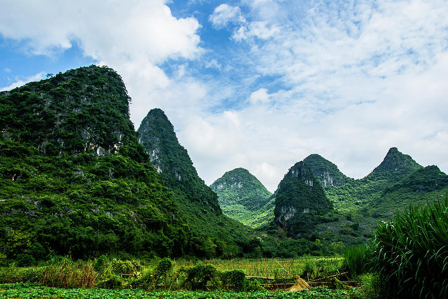 Karst mountains and  rural scenery #34 Photograph by Carl Ning