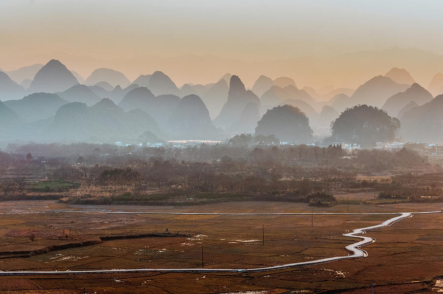 Karst mountains scenery in sunset  #34 Photograph by Carl Ning
