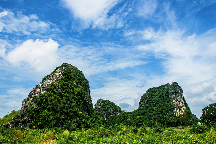Karst mountains and  rural scenery #35 Photograph by Carl Ning