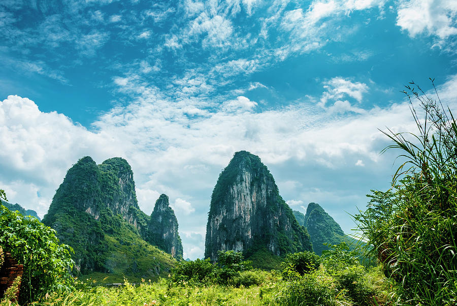 Karst mountains and  rural scenery #36 Photograph by Carl Ning