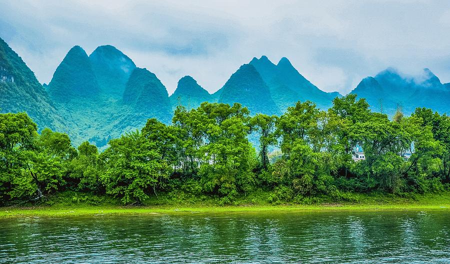 Karst mountains and Lijiang River scenery #37 Photograph by Carl Ning