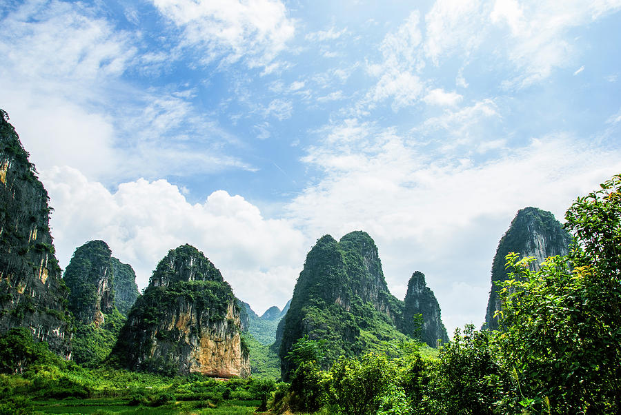 Karst mountains and  rural scenery #37 Photograph by Carl Ning