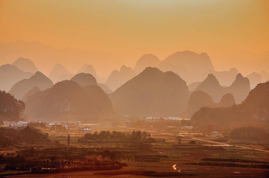 Karst mountains scenery in sunset #37 Photograph by Carl Ning