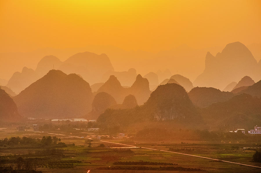 Karst mountains scenery in sunset #38 Photograph by Carl Ning