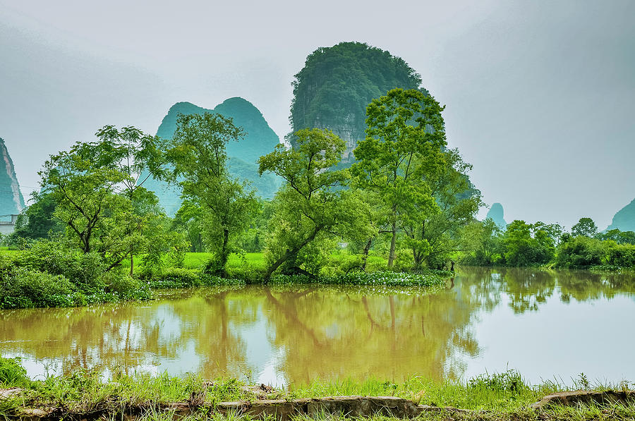 The beautiful karst rural scenery #39 Photograph by Carl Ning
