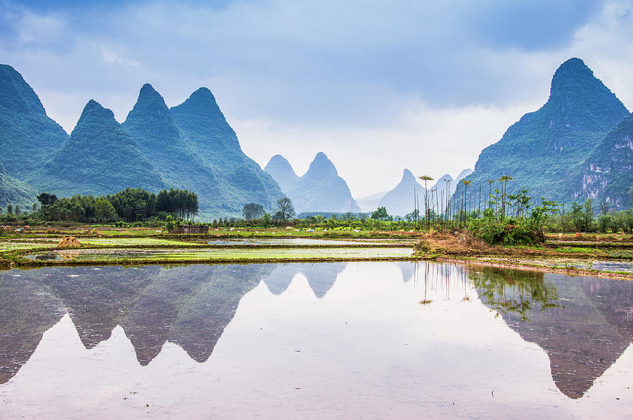 Karst mountains and rural scenery #4 Photograph by Carl Ning
