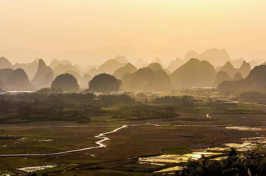 Karst mountains scenery in sunset #4 Photograph by Carl Ning