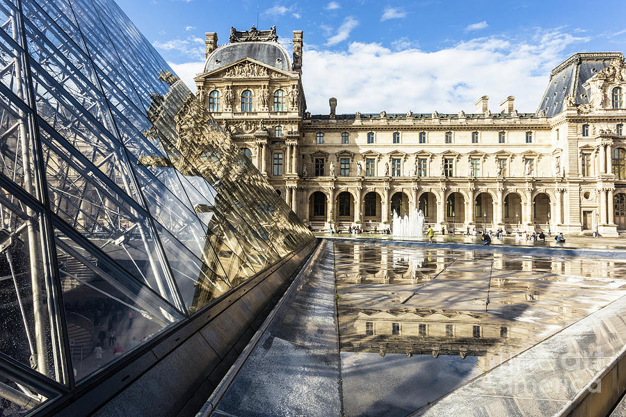 Louvre palace and pyramid in Paris #4 Photograph by Didier Marti