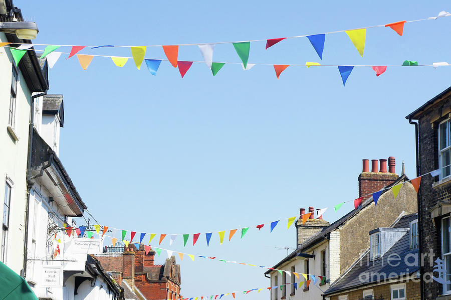 Street bunting flags #4 Photograph by Tom Gowanlock