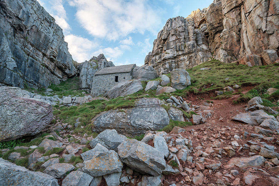 Stunning landscape image of St Govan's Chapel on Pemnrokeshire C ...