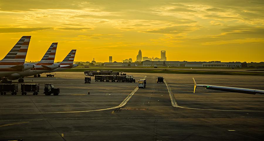Sun Rising Early Morning Over Charlotte Skyline Seen From Clt Ai #4 Photograph by Alex Grichenko