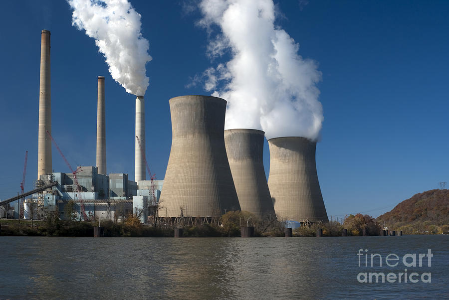 Three cooling towers at a power plant. #4 Photograph by Anthony Totah