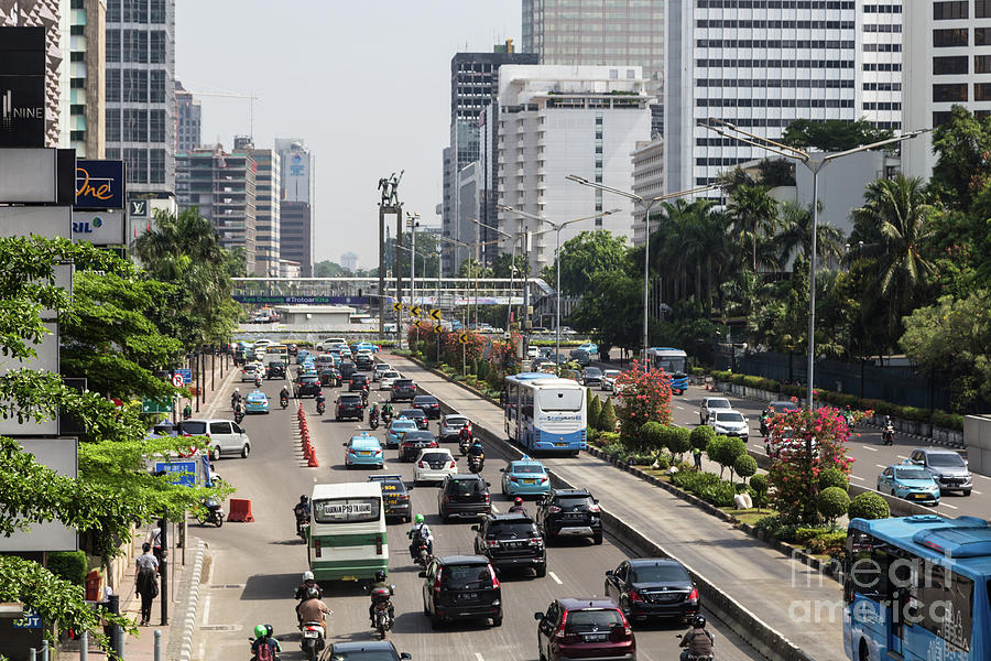 Traffic along Sudirman avenue in Jakarta, Indonesia capital city #4 Photograph by Didier Marti