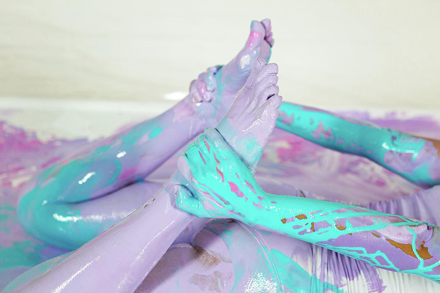 Woman Yogi Covered With Purple Paint Photograph