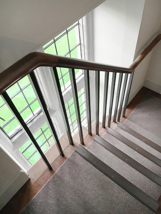 Wooden bannister Photograph by Tom Gowanlock